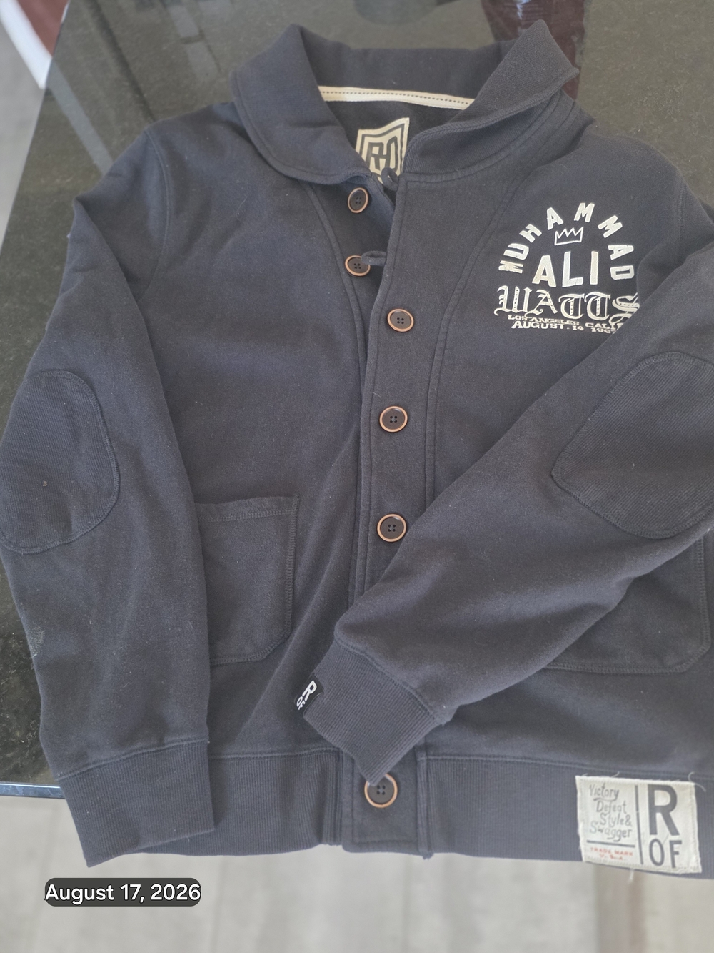 the Roots of Fight Muhammad Ali shawl collar cardigan (such as the 1967 Watts